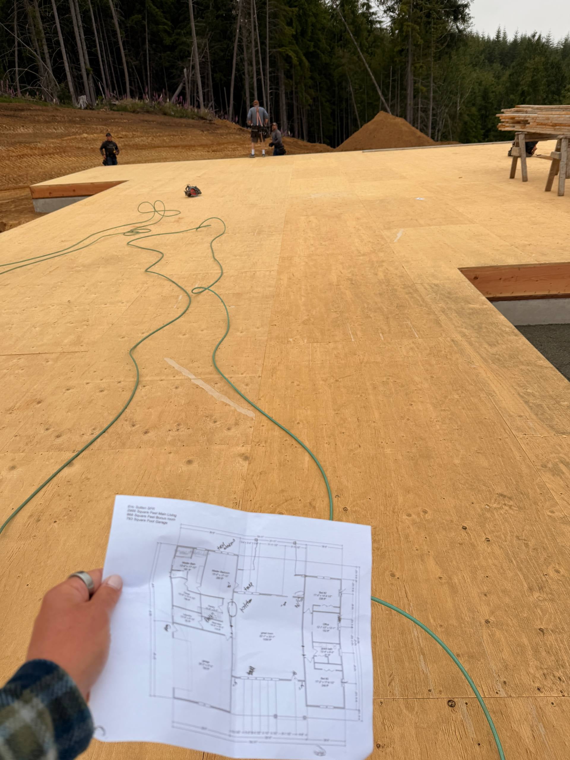 Barnum Homes construction crew on subfloor